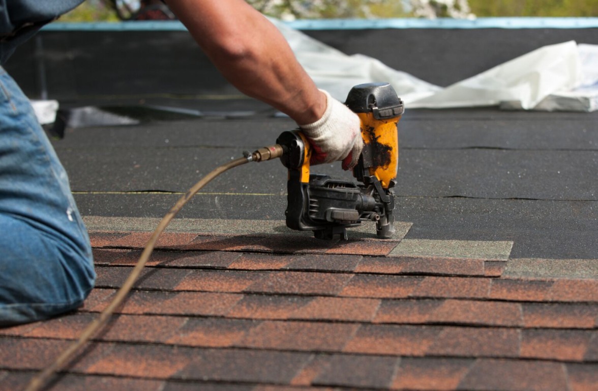 Professional roofer installing shingles in Brentwood, CA